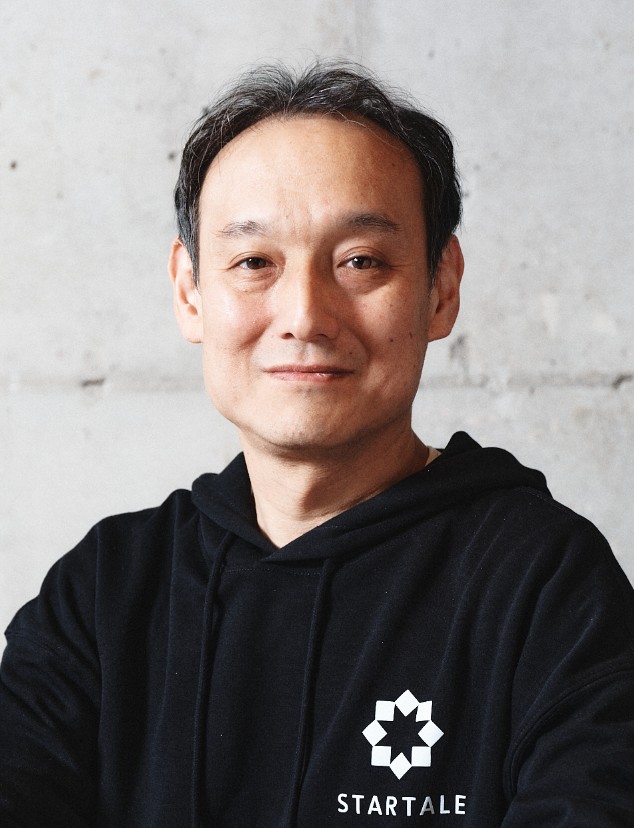 手塚 孝