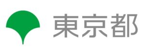 Logo of Tokyo Metropolis government featuring a green ginkgo leaf and the gray kanji 東京都.